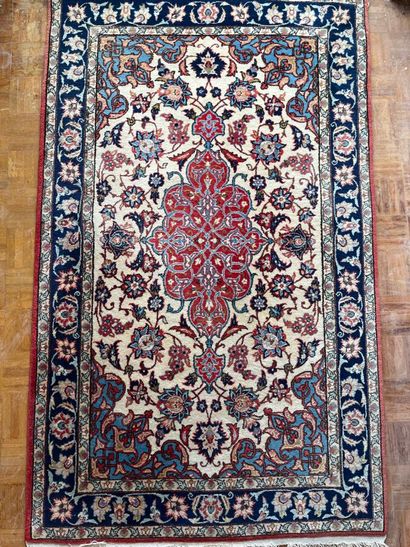 Lot including four carpets: 
- A tappis with...