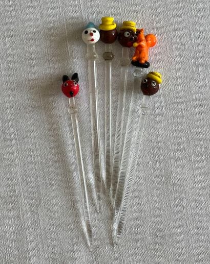 Six glass cocktail stirrers (one broken)...