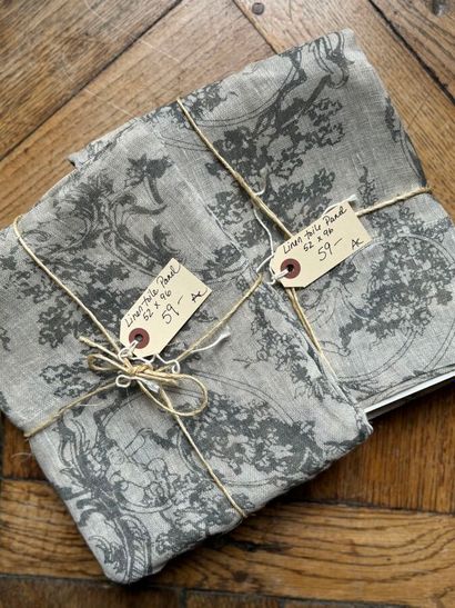 Two pieces of grey linen fabric with putti...