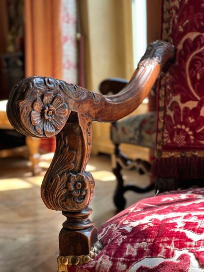 Large armchair in natural wood carved with...