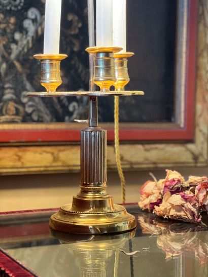 Three-light gilt bronze hot-water bottle...