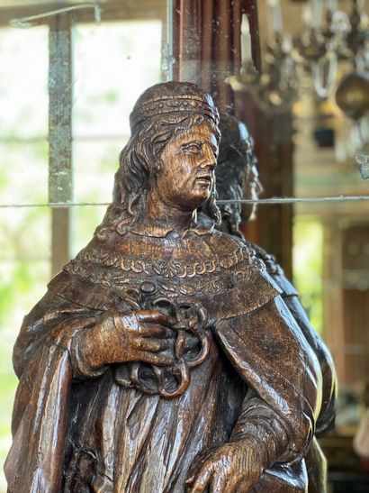 Carved natural wood sculpture of King Louis...
