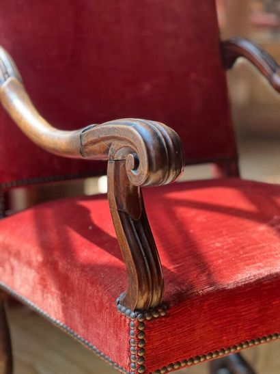 Armchair in carved natural wood, with curved...