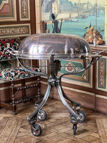 Silver-plated metal carving cart. The four-legged...