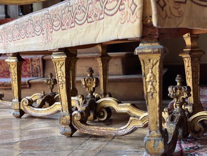 Carved and gilded wooden sofa, decorated...