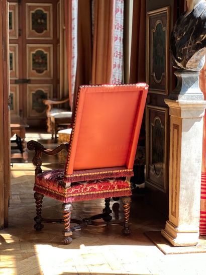 Large armchair in natural wood carved with...