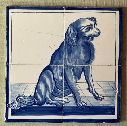 Quatre carreaux de faïence figurant un chien...