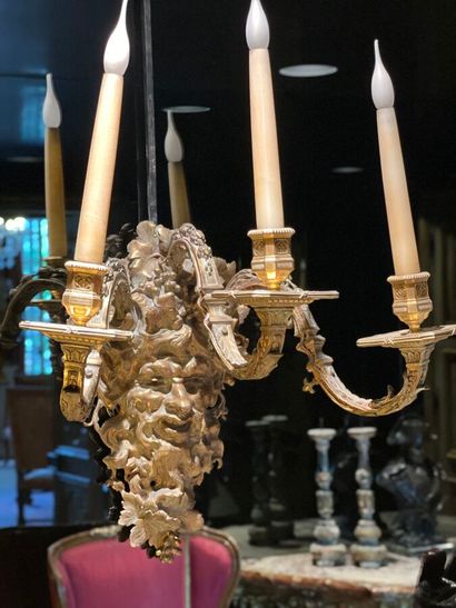 Pair of three-light bronze sconces adorned...