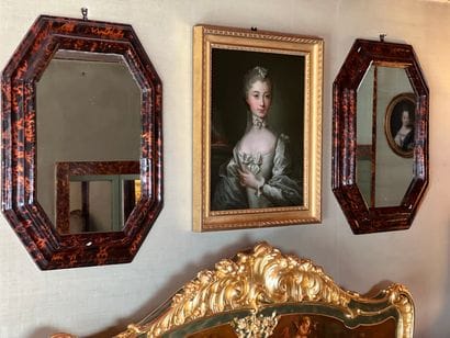 Paire de miroirs octogonaux en bois laqué...