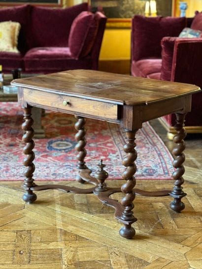 Turned natural wood coffee table on four...