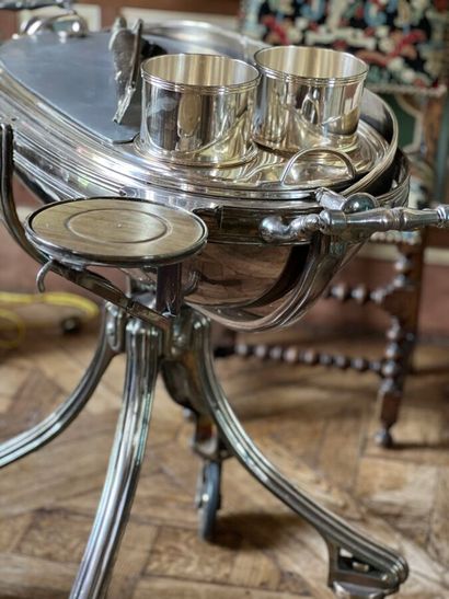 Silver-plated metal carving cart. The four-legged...