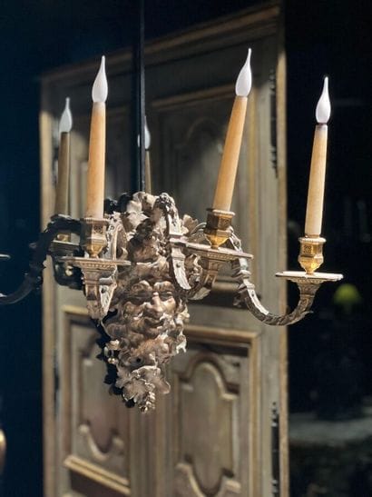 Pair of three-light bronze sconces adorned...