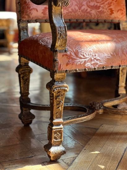 Pair of large armchairs in richly carved,...