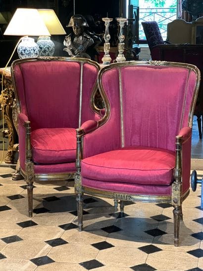 Pair of carved and gilded wood bergères with...