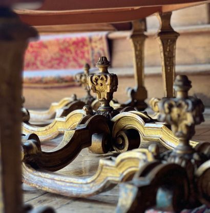 Carved and gilded wooden sofa, decorated...