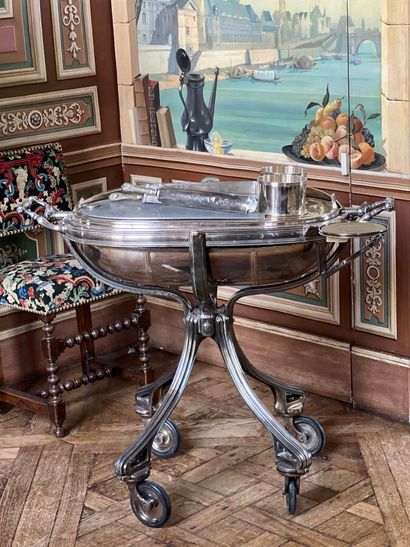 Silver-plated metal carving cart. The four-legged...