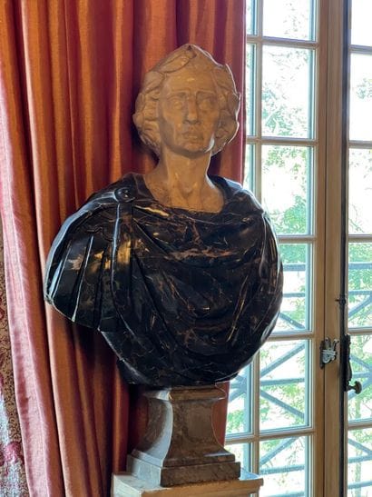Sculpted pedestal bust in white and gray...