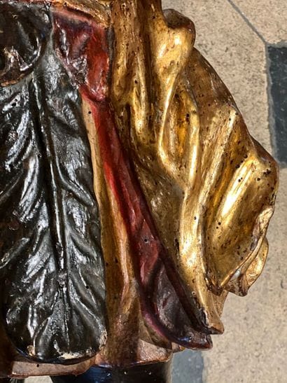 Pair of polychrome and gilded carved wood...