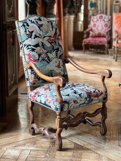 Pair of armchairs in natural wood. The legs...