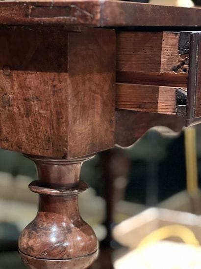 Walnut table in the Louis XIII style opening...