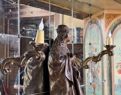 Pair of varnished wood arms decorated with...