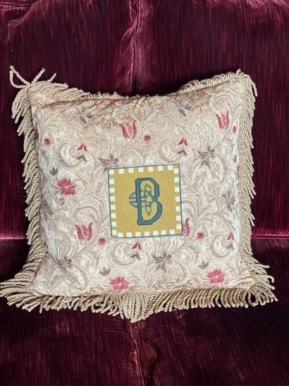 Cushion, decorated with fringed braid, monogrammed...