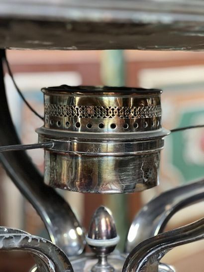 Silver-plated metal carving cart. The four-legged...