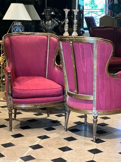 Pair of carved and gilded wood bergères with...