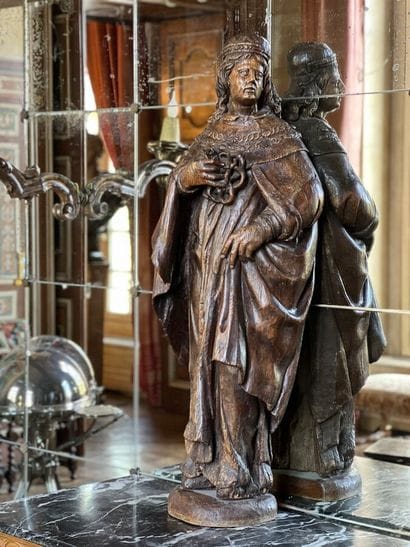 Carved natural wood sculpture of King Louis...