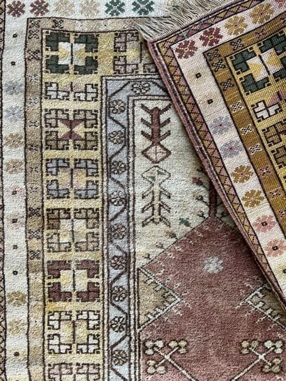 Oriental beige carpet with cream border centered...