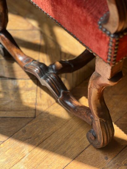 Armchair in carved natural wood, with curved...