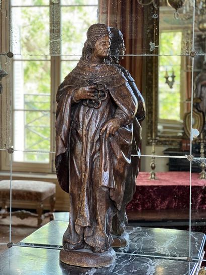Carved natural wood sculpture of King Louis...