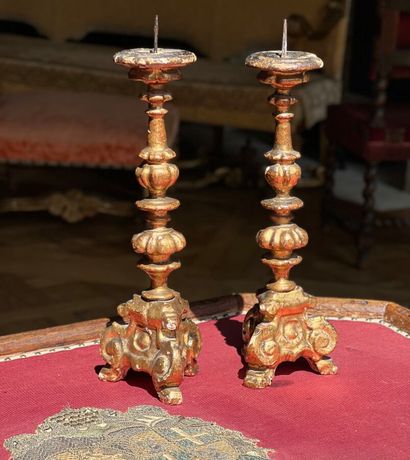 Two carved and gilded wood tripod pedestals...