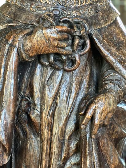 Carved natural wood sculpture of King Louis...