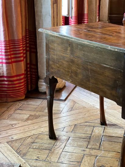 Wood veneer table-top opening to three drawers...