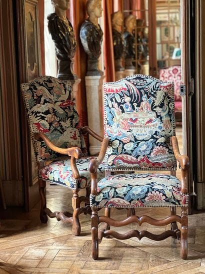 Pair of armchairs in natural wood. The legs...