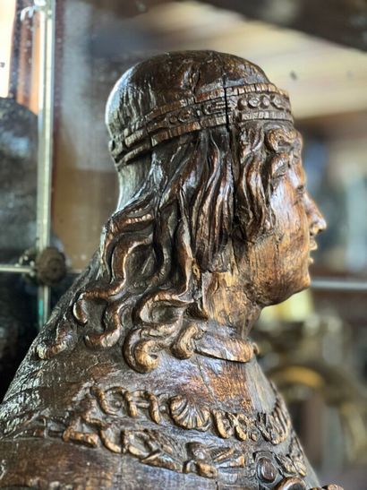 Carved natural wood sculpture of King Louis...