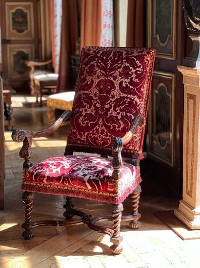 Large armchair in natural wood carved with...