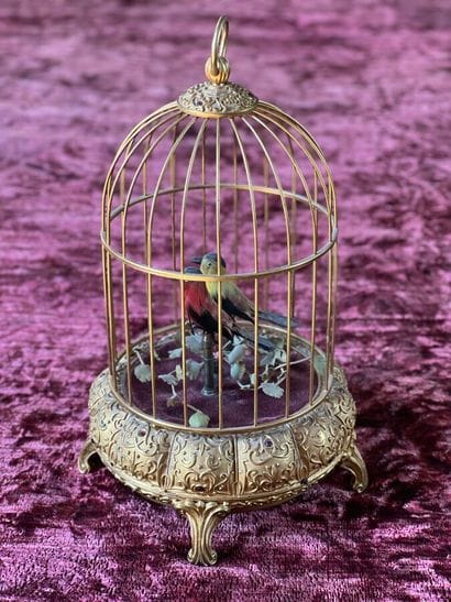 Cage à oiseaux mécaniques chantants. Le piétement...