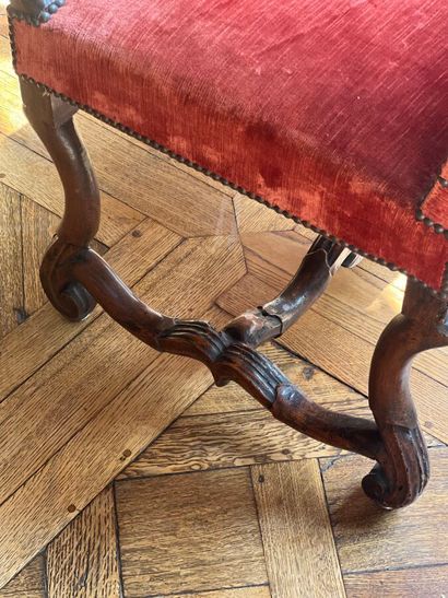 Armchair in carved natural wood, with curved...