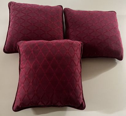 Set of three red damask cushions with trellis...