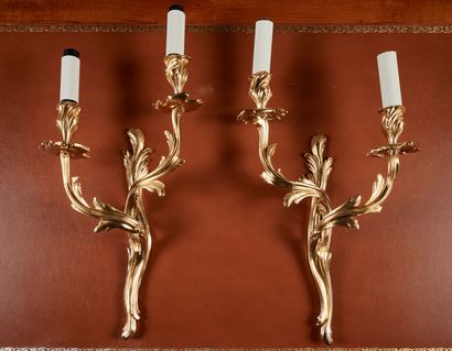 Pair of Louis XV style two-light sconces...