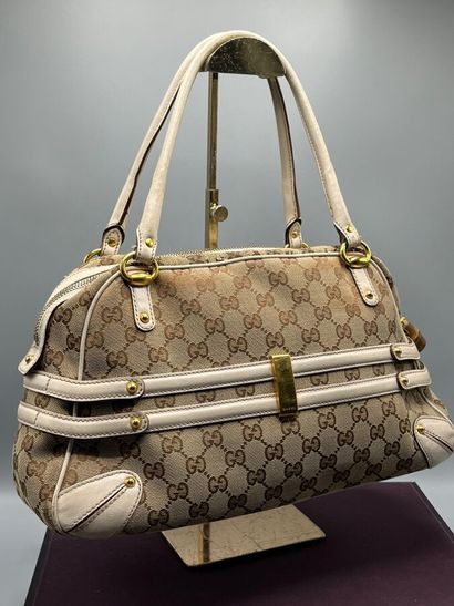 GUCCI - GG supreme bit canvas handbag.

Made...