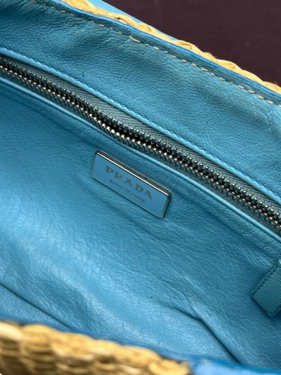 PRADA Milano - Baguette paglia mix.

The...