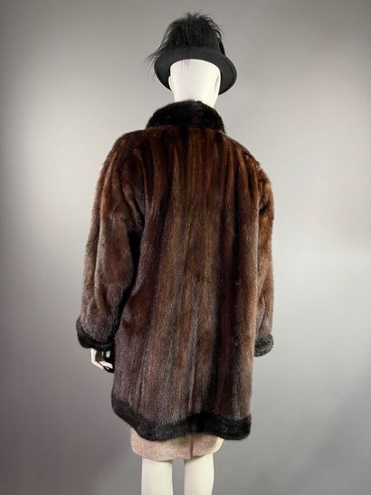 Yves Saint Laurent mink-lined coat.

Brown...