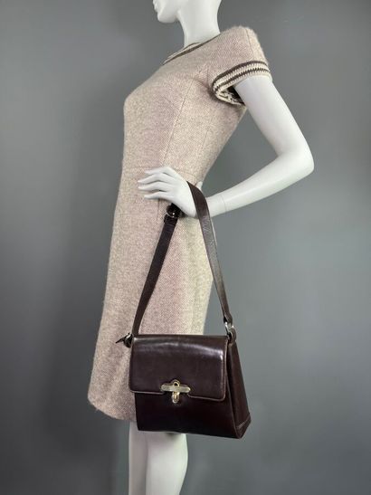 GUCCI - années 70 - Handbag.

Brown leather....