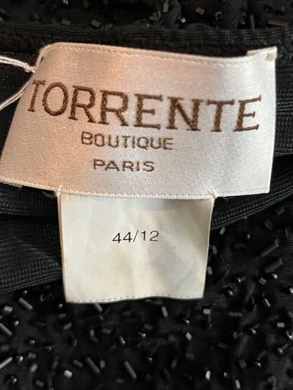TORRENTE Boutique - Beaded evening gown.

Cut...