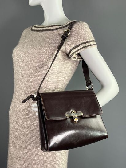 GUCCI - années 70 - Handbag.

Brown leather....