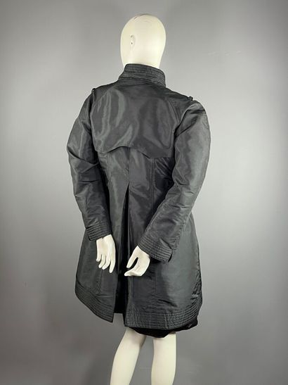 FENDI Roma - Trench coat.

Cut in black nylon...