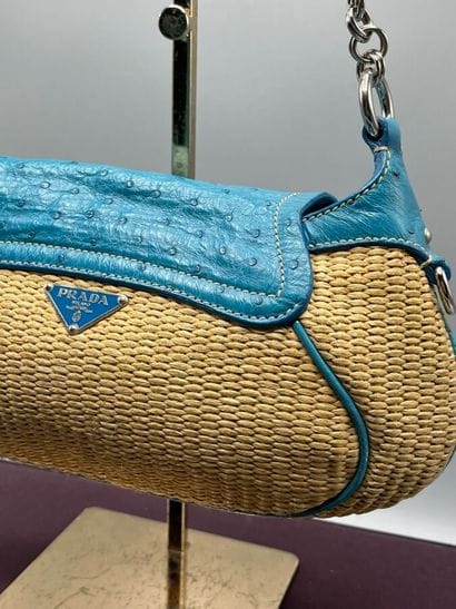 PRADA Milano - Baguette paglia mix.

The...